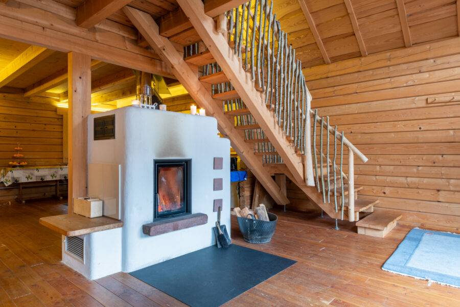 Der Grundofen sorgt in unserem Schwarzwald Blockhaus für die optimale Wärme